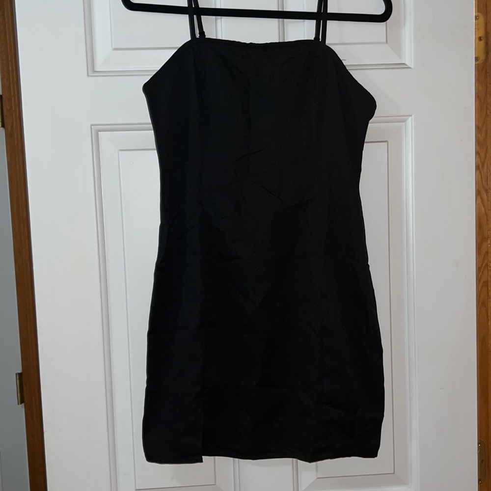 Black mini dress with slit